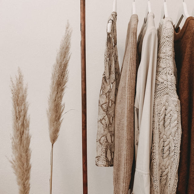 Natural fibres and garments in a warm neutral palette
