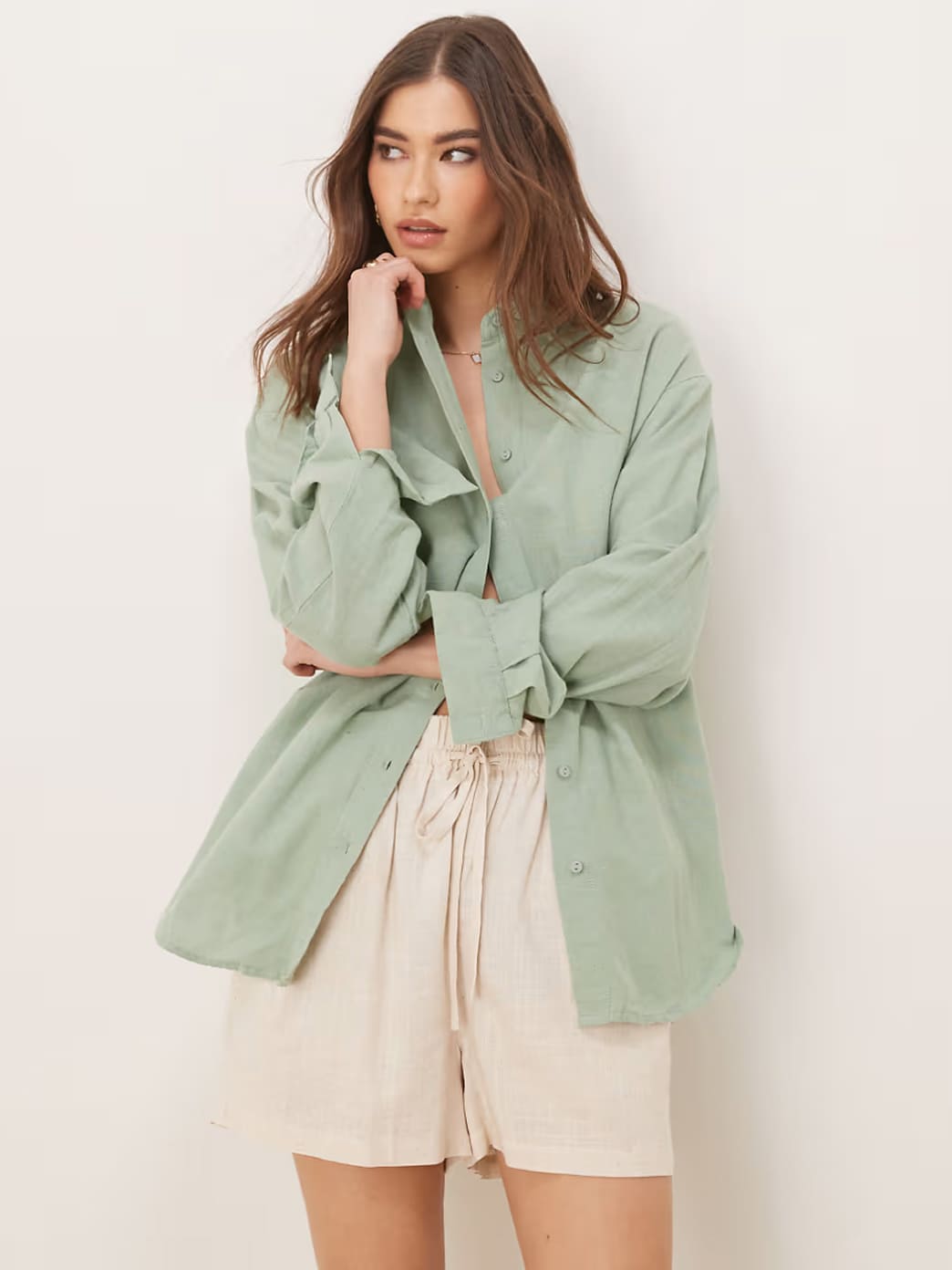 Sage linen shirt and shorts, front view