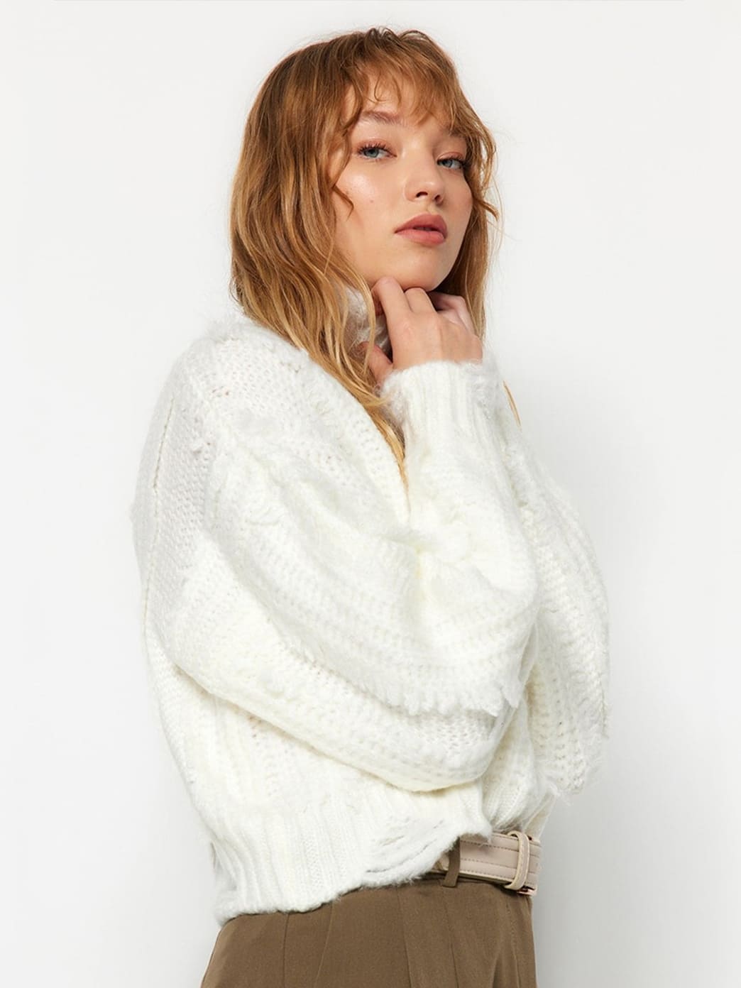 Cloud cable-knit sweater, side view
