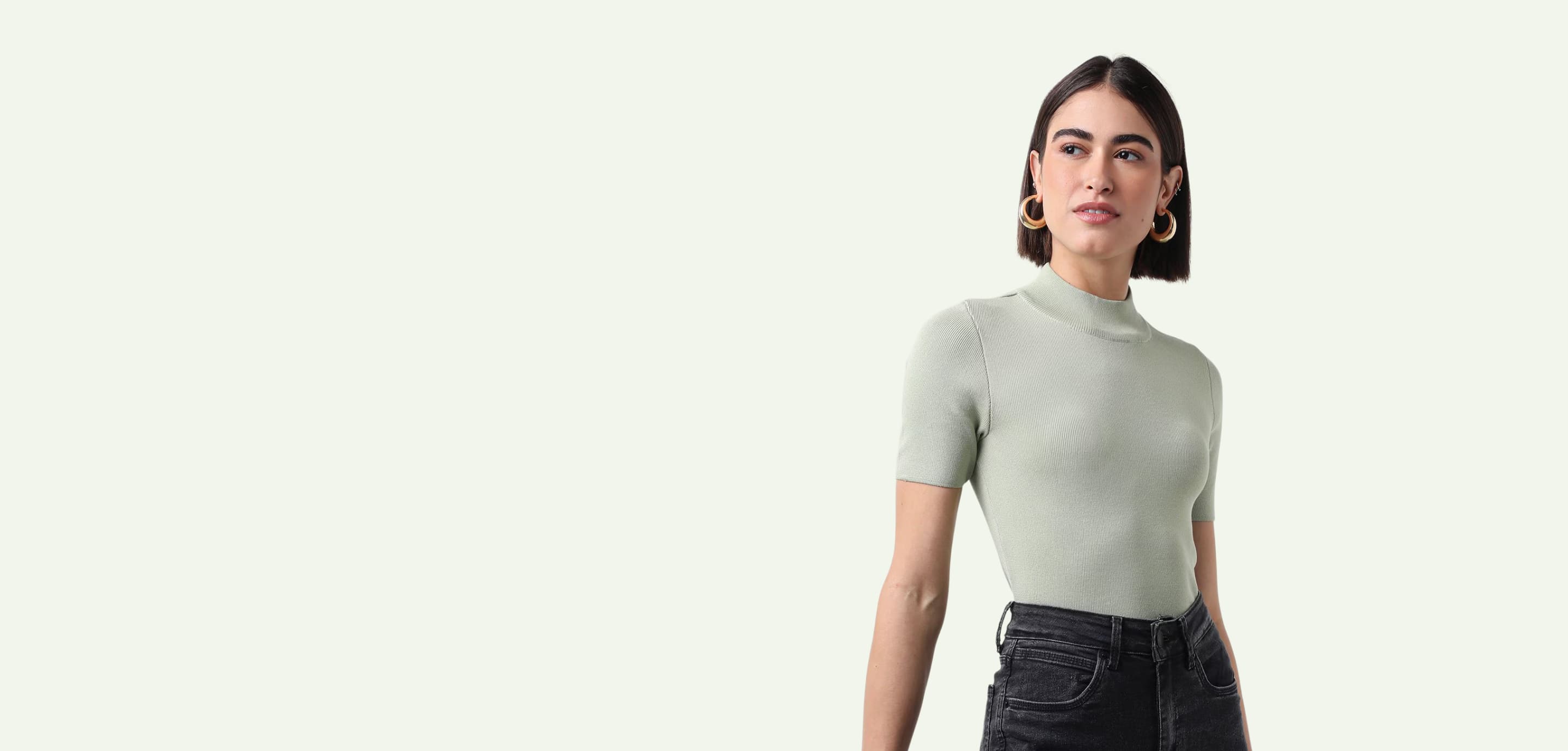 Woman wearing a sage fine-knit top
